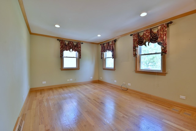 7931 W Metropole St, Elmwood Park, IL 60707 - empty room featuring plenty of natural light, ornamental molding, light wood-type flooring, and recessed lighting
