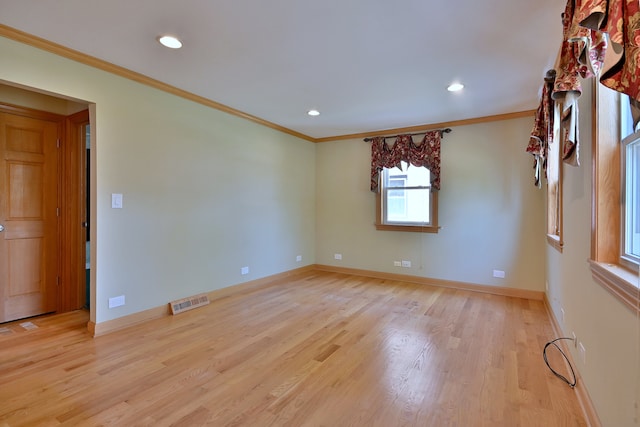 7931 W Metropole St, Elmwood Park, IL 60707 - unfurnished room with crown molding, light wood-type flooring, and recessed lighting