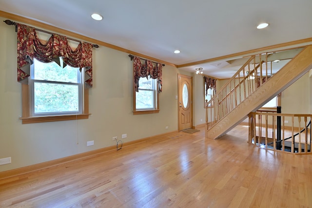 7931 W Metropole St, Elmwood Park, IL 60707 - foyer entrance with healthy amount of natural light, wood finished floors, stairway, recessed lighting, and crown molding