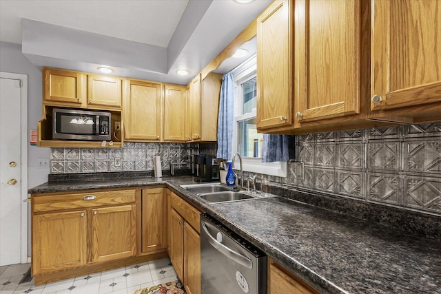 302 S Orr Dr, Normal, IL 61761 - kitchen featuring stainless steel appliances, decorative backsplash, and dark countertops