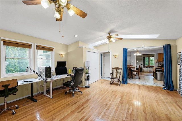 302 S Orr Dr, Normal, IL 61761 - office area with ceiling fan, wood-type flooring, vaulted ceiling, and a skylight
