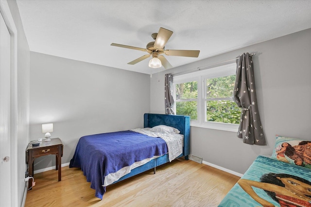 302 S Orr Dr, Normal, IL 61761 - bedroom with wood finished floors and ceiling fan