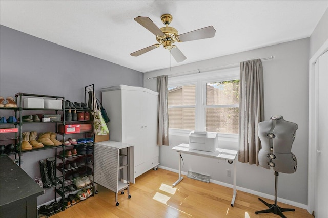 302 S Orr Dr, Normal, IL 61761 - misc room featuring light wood-style floors and a ceiling fan