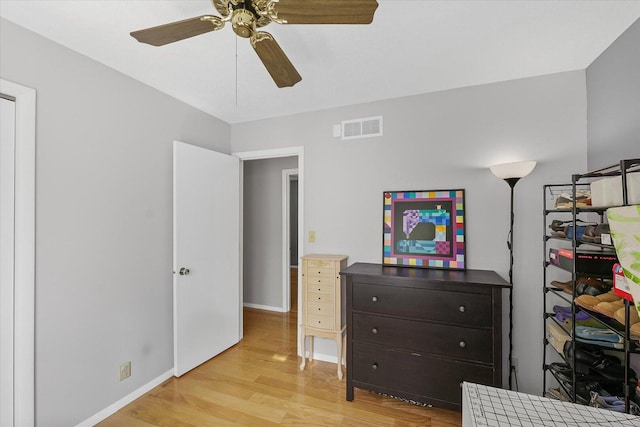 302 S Orr Dr, Normal, IL 61761 - bedroom with light wood-style floors and a ceiling fan