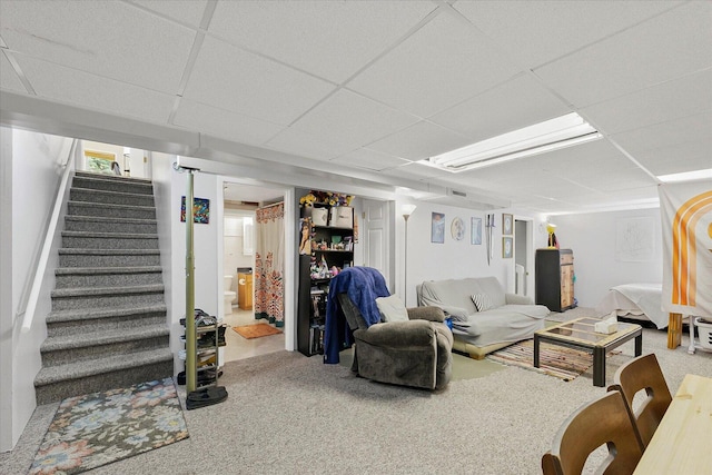 302 S Orr Dr, Normal, IL 61761 - living area featuring a paneled ceiling, carpet floors, and stairway