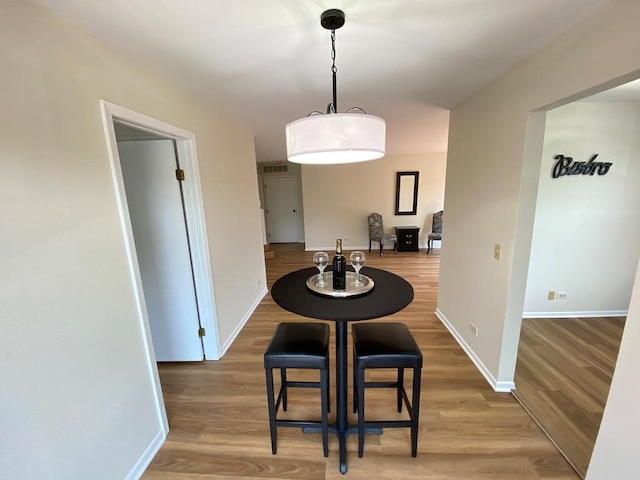 1340 Mcdowell Rd Unit 201, Naperville, IL 60563 - dining space with light wood finished floors and baseboards