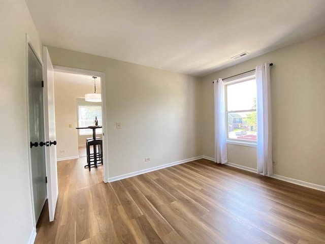 1340 Mcdowell Rd Unit 201, Naperville, IL 60563 - empty room featuring wood finished floors