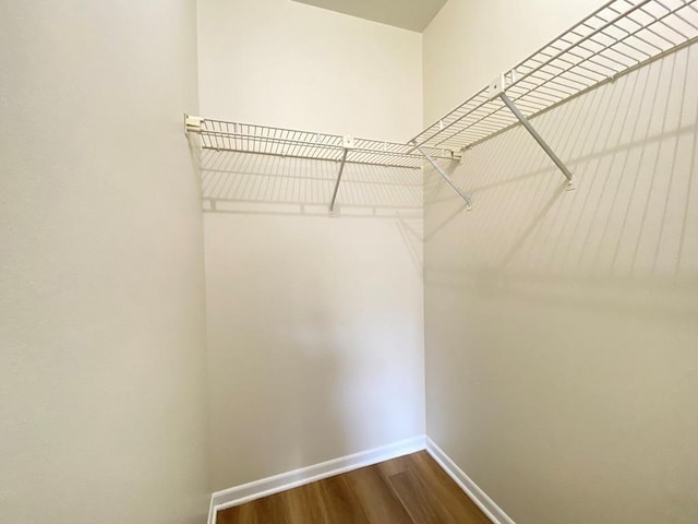 1340 Mcdowell Rd Unit 201, Naperville, IL 60563 - spacious closet with dark wood-style flooring