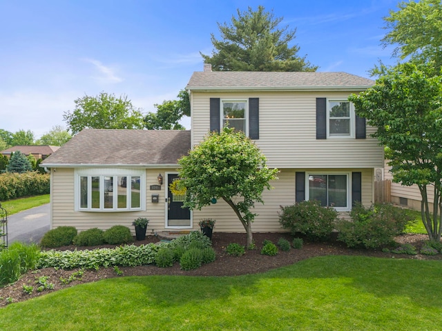 1341 S Sumner St, Wheaton, IL 60189 - view of front of home with a front yard, a chimney, and a shingled roof
