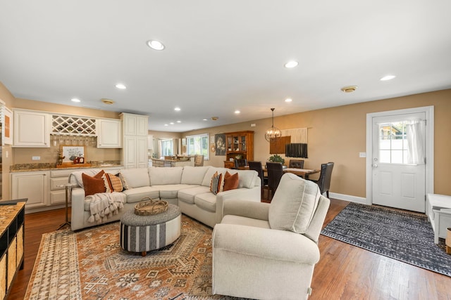 1341 S Sumner St, Wheaton, IL 60189 - living room featuring recessed lighting, a dry bar, wood finished floors, and a chandelier