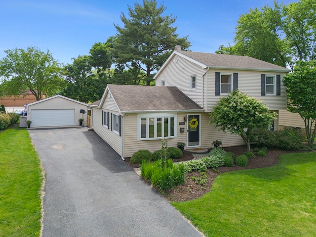 1341 S Sumner St, Wheaton, IL 60189 - traditional home with a detached garage, an outdoor structure, a chimney, a front lawn, and a shingled roof