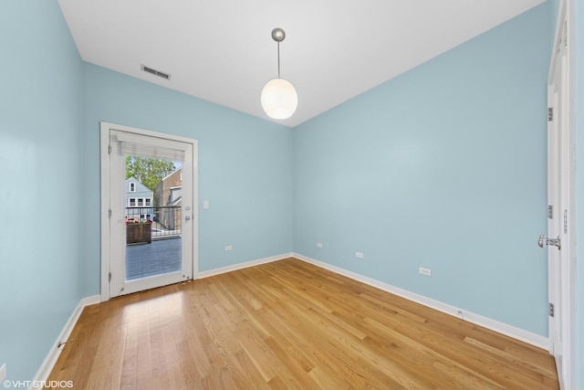 2033 N Damen Ave Unit 2N, Chicago, IL 60647 - unfurnished room featuring light wood-style floors and baseboards