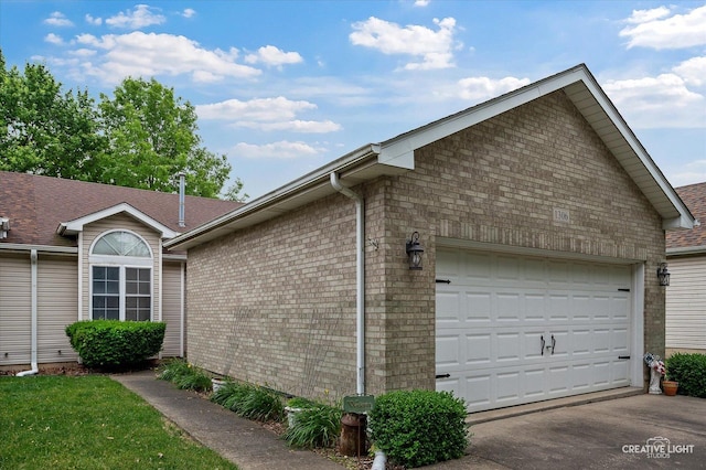1306 Riverview Dr, Joliet, IL 60431 - view of property exterior featuring driveway and a garage