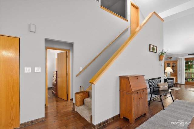 1306 Riverview Dr, Joliet, IL 60431 - stairs with wood-type flooring and a towering ceiling