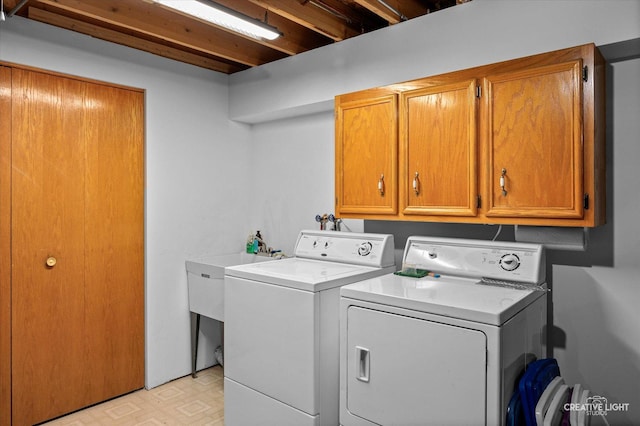 1306 Riverview Dr, Joliet, IL 60431 - washroom featuring washer and clothes dryer and cabinet space