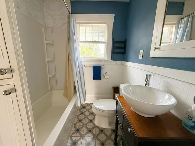 207 College Ave, Dixon, IL 61021 - full bathroom with a wainscoted wall, vanity, and shower / bath combination with curtain