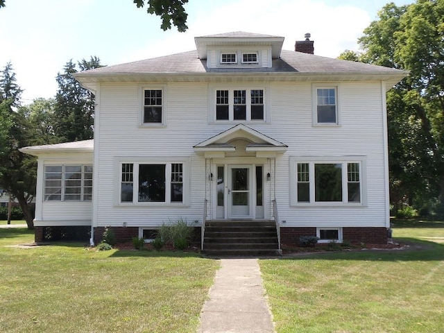 1201 Old Indian Town Rd, Henry, IL 61537 - american foursquare style home with a front yard and a chimney