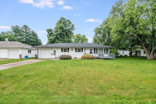 305 E Marshall St, Tolono, IL 61880 - single story home with driveway, a garage, and a front lawn