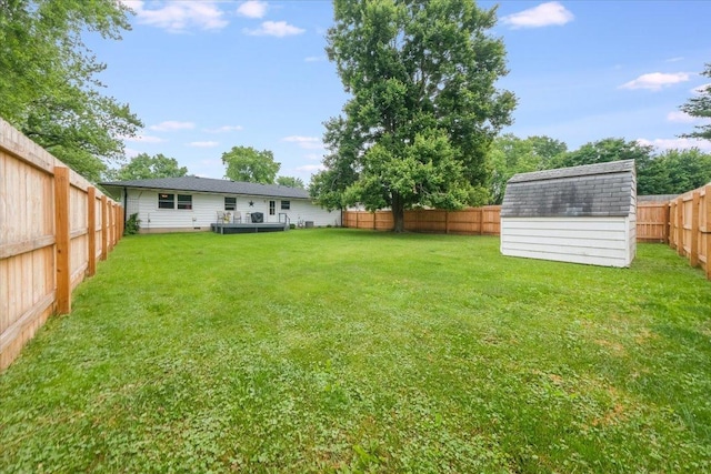 305 E Marshall St, Tolono, IL 61880 - fenced backyard with a storage unit