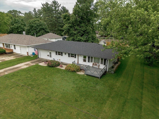 305 E Marshall St, Tolono, IL 61880 - ranch-style home featuring driveway, a front yard, roof with shingles, and a garage