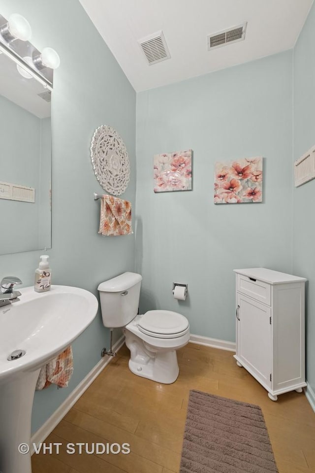 950 Genesee Dr, Naperville, IL 60563 - bathroom featuring toilet and wood finished floors