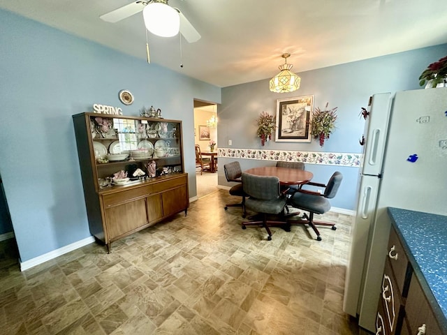 411 1st Ave, Ottawa, IL 61350 - dining room featuring stone finish flooring and a ceiling fan