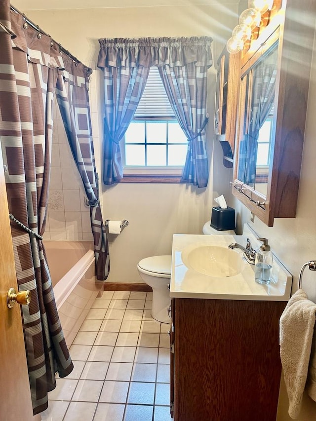 411 1st Ave, Ottawa, IL 61350 - bathroom featuring tile patterned flooring, healthy amount of natural light, vanity, and shower / bath combo
