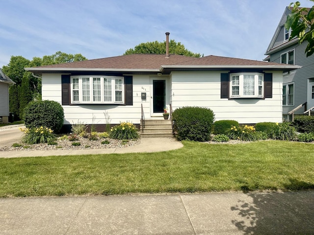 411 1st Ave, Ottawa, IL 61350 - view of front of house with entry steps and a front lawn