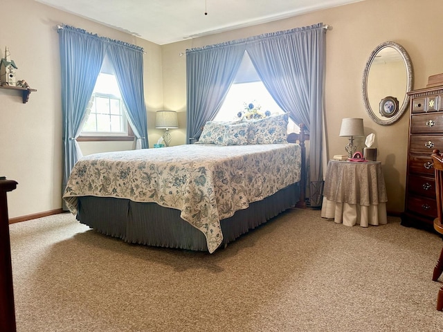 411 1st Ave, Ottawa, IL 61350 - carpeted bedroom featuring baseboards