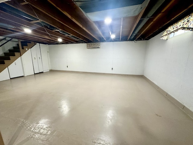 411 1st Ave, Ottawa, IL 61350 - unfinished basement featuring stairway and baseboards