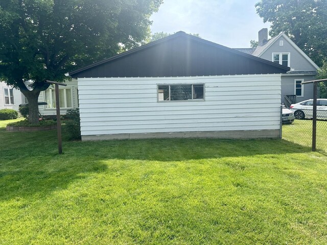 411 1st Ave, Ottawa, IL 61350 - view of side of property featuring a chimney