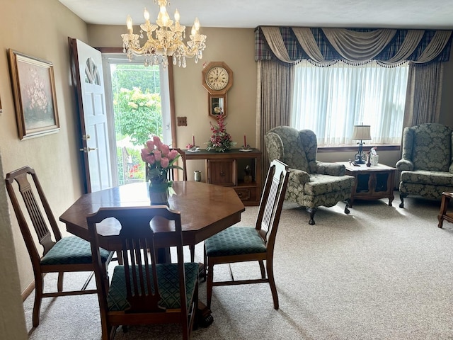 411 1st Ave, Ottawa, IL 61350 - dining space with carpet and a chandelier
