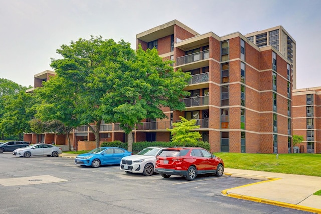 2941 S Michigan Ave Unit 305, Chicago, IL 60616 - view of apartment building / complex featuring uncovered parking