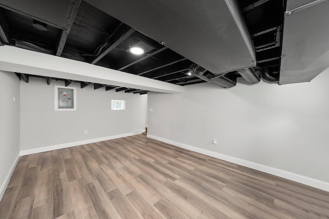 114 Maple St, Mchenry, IL 60051 - basement with wood finished floors