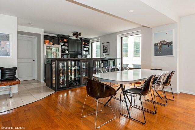 40 E Delaware Pl Unit 1502, Chicago, IL 60611 - dining area with light wood-style floors and baseboards