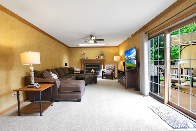 747 Warwick Ct, Carol Stream, IL 60188 - living area with carpet, a ceiling fan, ornamental molding, and a lit fireplace