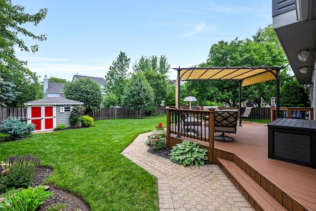 747 Warwick Ct, Carol Stream, IL 60188 - fenced backyard with a shed, a pergola, a deck, and outdoor dining space