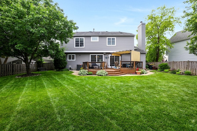 747 Warwick Ct, Carol Stream, IL 60188 - rear view of house featuring a fenced backyard, a deck, and a chimney