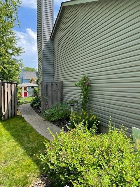 747 Warwick Ct, Carol Stream, IL 60188 - view of side of home with a chimney