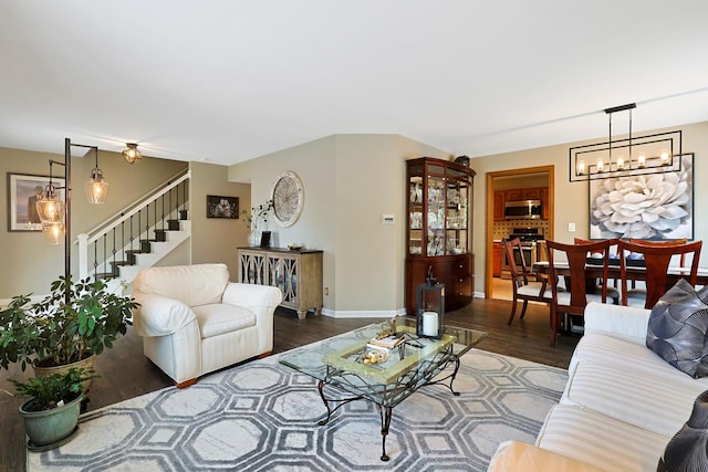 747 Warwick Ct, Carol Stream, IL 60188 - living room with wood finished floors, stairway, and a chandelier
