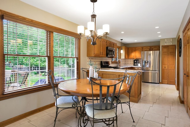 747 Warwick Ct, Carol Stream, IL 60188 - dining space featuring a chandelier, recessed lighting, and light tile patterned floors