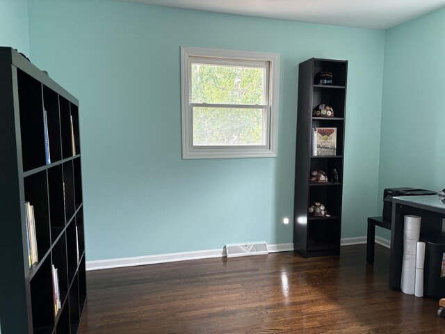 535 N Midlothian Rd, Mundelein, IL 60060 - unfurnished office with dark wood-type flooring and baseboards