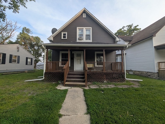 1350 E Chestnut St, Kankakee, IL 60901 - view of front of property with covered porch and a front lawn