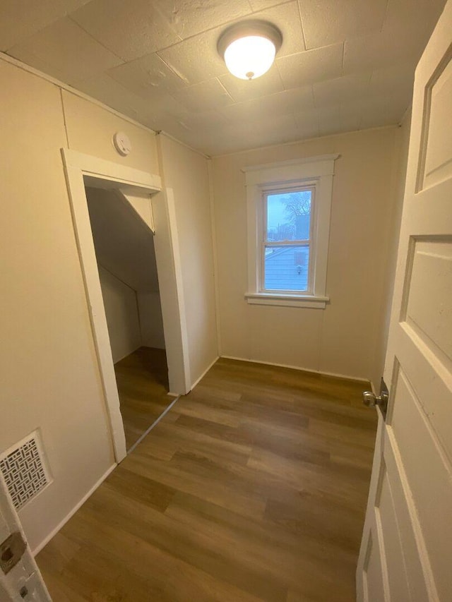 1350 E Chestnut St, Kankakee, IL 60901 - unfurnished bedroom with wood finished floors and a closet