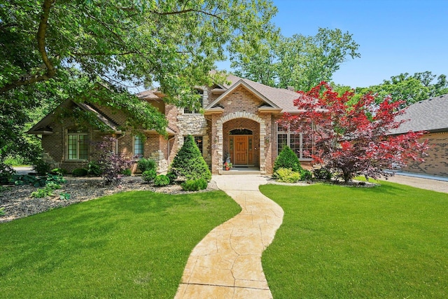 15501 116th Ct, Orland Park, IL 60467 - traditional home with a front yard, brick siding, and stone siding