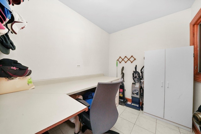 15501 116th Ct, Orland Park, IL 60467 - office space with built in study area, light tile patterned flooring, and vaulted ceiling