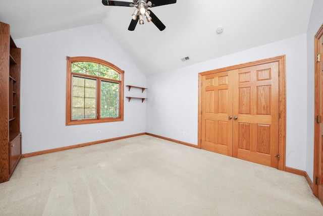15501 116th Ct, Orland Park, IL 60467 - unfurnished bedroom featuring vaulted ceiling, light carpet, a ceiling fan, and a closet