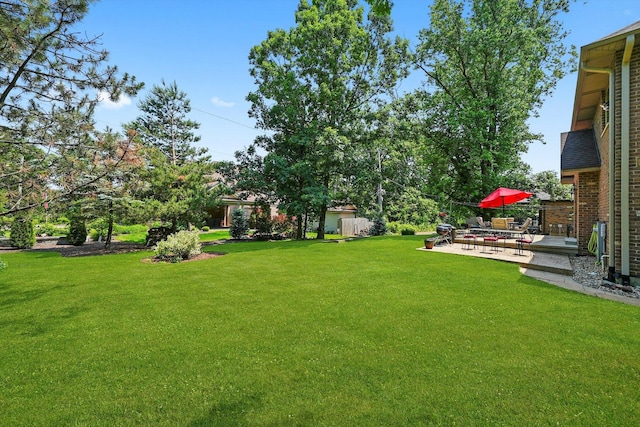 15501 116th Ct, Orland Park, IL 60467 - view of green lawn featuring a patio area