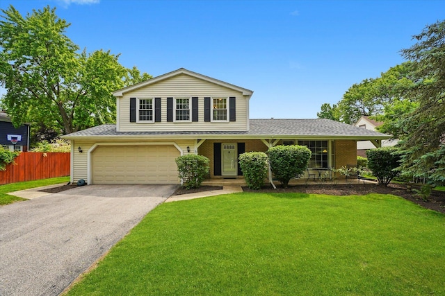 1554 Chickasaw Dr, Naperville, IL 60563 - traditional-style house featuring driveway, a shingled roof, a garage, and covered porch