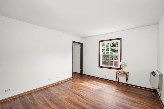 1554 Chickasaw Dr, Naperville, IL 60563 - empty room with wood finished floors and a wall unit AC